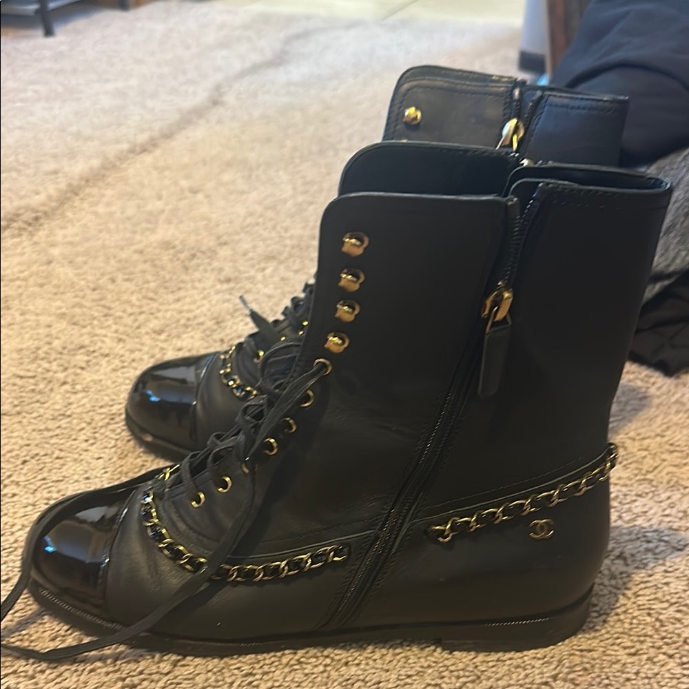 CHANEL Black Leather Boots with Gold Chain Detail